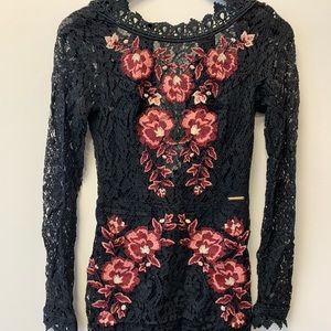 Black lace dress with embroidery and beading